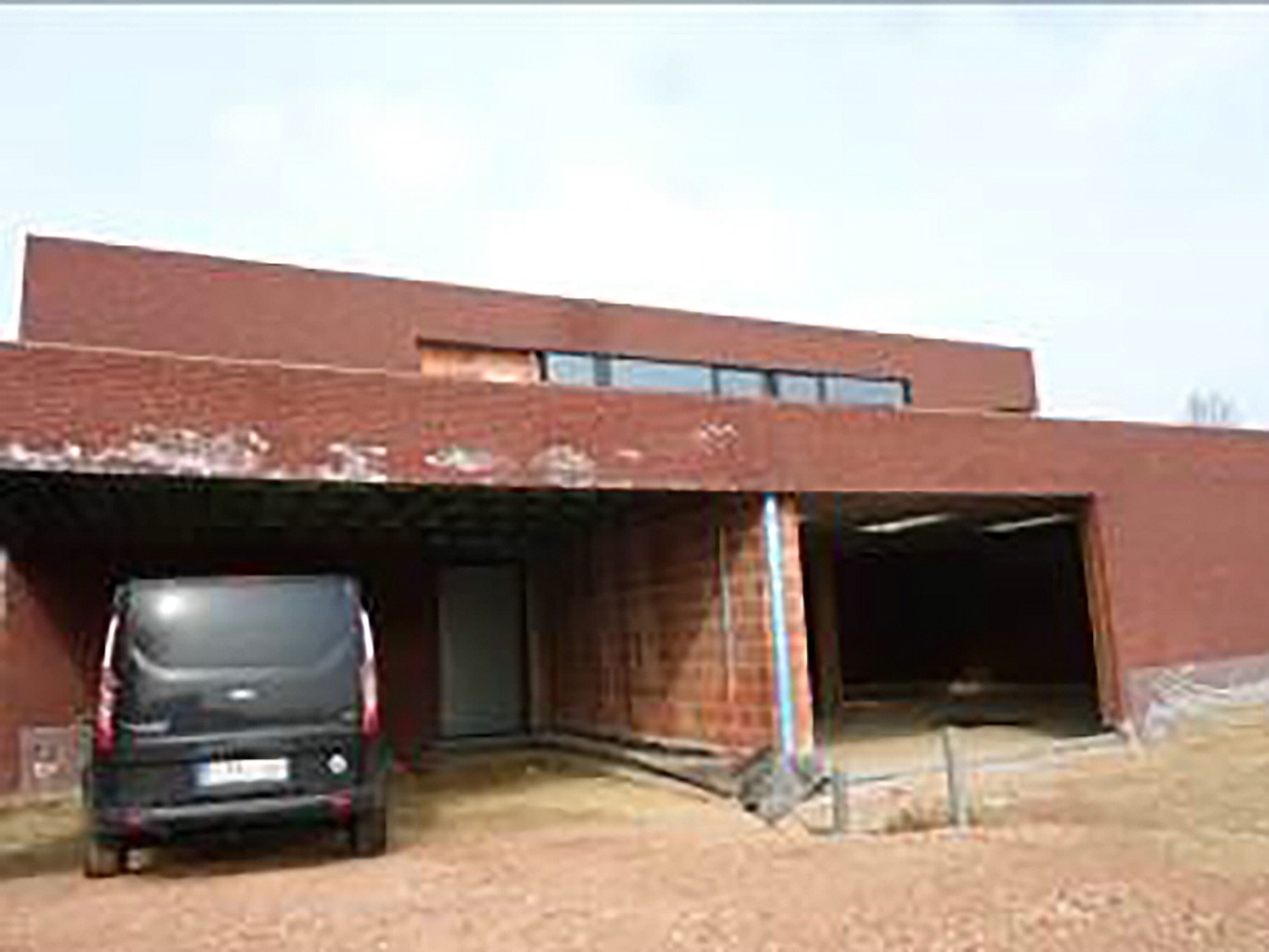 Woning + loods te Rijmenam